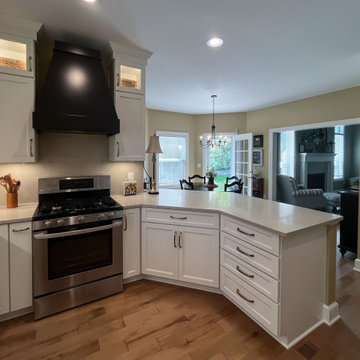 White Kitchen with Black Range Hood and Taj Royale quartz Countertops