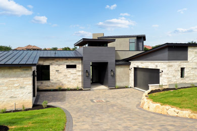 Large minimalist two-story house exterior photo in Austin