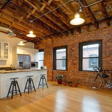High gloss European frameless loft kitchen in Newark, NJ