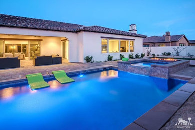 Inspiration for a large timeless backyard rectangular lap hot tub remodel in Los Angeles
