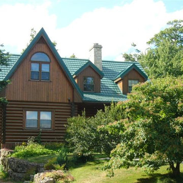 Ontario log homes with Hy-Grade's permanent steel roofing solution