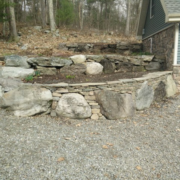 Semi-Dry laid retaining wall on exisiting boulders