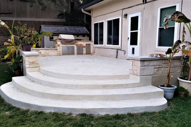Large eclectic backyard patio photo in Austin