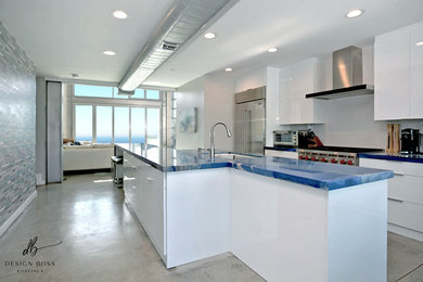 Kitchen - small contemporary concrete floor and gray floor kitchen idea in San Diego