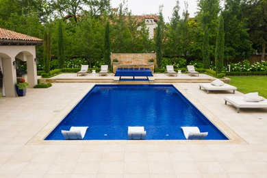 Design ideas for a modern backyard rectangular pool in Dallas with a hot tub.