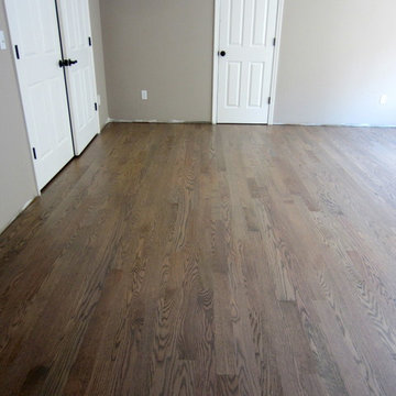 NISSEQUOGUE:  2 1/4" RED OAK W/ CUSTOM GREY BLEND STAIN + BONA TRAFFIC HD SATIN