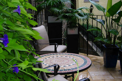 Mid-sized stamped concrete patio photo in Chicago