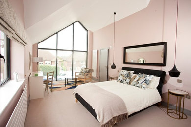 Inspiration for a modern bedroom in Surrey.