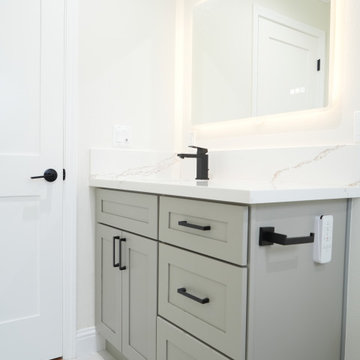 Modern Small Bathroom Remodel with Grey RTA Vanity Cabinets and Black Fixtures