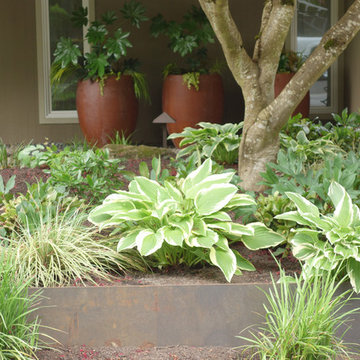 Modern Entry Garden with Private Sitting Area