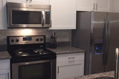 Example of a minimalist kitchen design in Atlanta