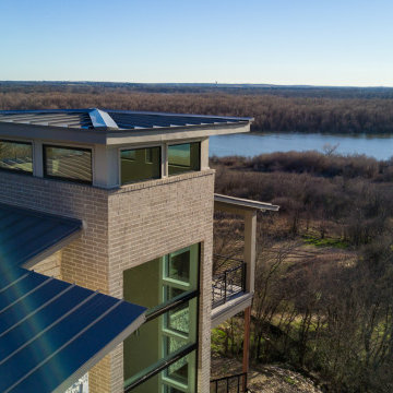 Milgard Black Fiberglass and Aluminum Windows and Doors - TX Lake House
