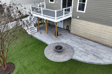 Modern Paver Patio with Artificial Turf and Putting Green