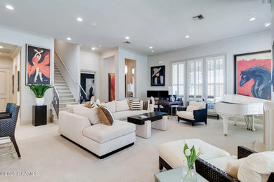 Trendy open concept carpeted and beige floor living room photo in San Francisco with white walls