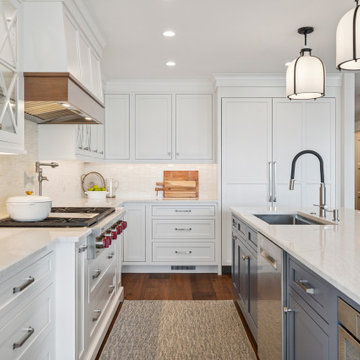 Bright Kitchen with Quartzite Countertops and Custom Range Hood