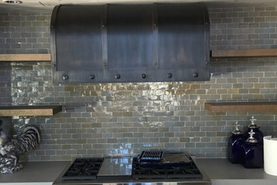 Inspiration for a transitional kitchen remodel in Phoenix with black appliances