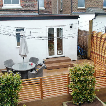 Millboard deck, artificial grass and cedar slat fencing in Reigate