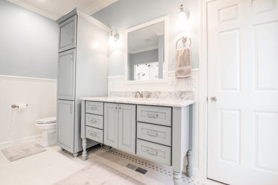 Design ideas for a large country master bathroom in Sacramento with furniture-like cabinets, blue cabinets, an open shower, a two-piece toilet, white tile, subway tile, blue walls, mosaic tile floors, an undermount sink, marble benchtops, white floor, a hinged shower door and white benchtops.