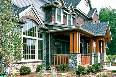 Example of a large classic exterior home design in Other