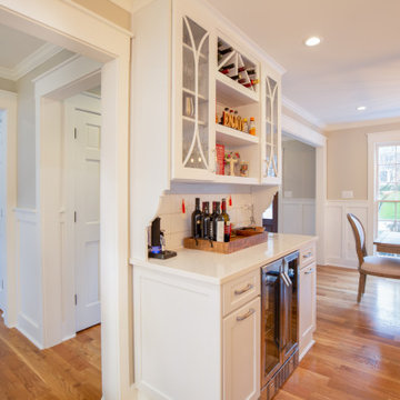 We widened openings, removed walls and reorganized the kitchen layout. The beve