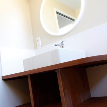 Meuble vasque en Sipo huilé