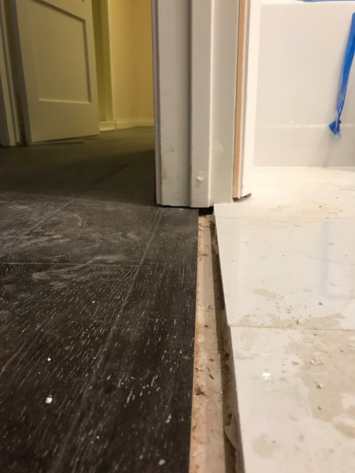 Need Ideas On How Best To Cover Uneven Transition From Wood Tile - How To Fix Uneven Bathroom Floorboards