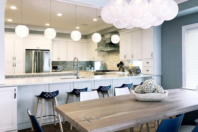 Example of a beach style dining room design in New York