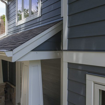 Shiny new Andersen Windows, Evening Blue James Hardie siding & stone accents