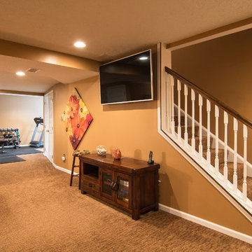 Finished basement with exercise area and small bath in Wexford, PA