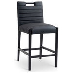 Meridian Furniture - Aimee Upholstered Counter Stool, Black, Vegan Leather, Black Finish - A perfect fusion of modern elegance and eco-friendly luxury is the Aimee black vegan leather counter stool. Upholstered in sleek vegan leather, this counter-height stool offers a chic, contemporary look while maintaining a commitment to sustainable living. The padded, quilted design featuring solid black oak wood legs creates a stunning contrast between its soft upholstery and minimalist frame.