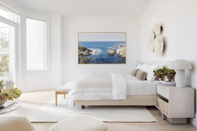Inspiration for a huge transitional light wood floor and beige floor bedroom remodel in San Francisco with white walls