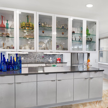 Contemporary High-Gloss Kitchen Remodel | Glass Display Cabinets & Modern Gray B