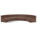 Meridian Furniture - Arc Vegan Leather Upholstered 7-Pc. U-Shaped Modular Sectional, Brown - Unleash modern opulence with the Arc Vegan Leather 7pc. Sectional. Crafted for the modern connoisseur, this Sectional injects an air of refined luxury into any space. Its sleek silhouette, upholstered in supple brown vegan leather, exudes timeless sophistication while the deep channel tufting adds textural intrigue, further elevating the chair's visual appeal. The modular design makes it a versatile chameleon, effortlessly adapting to your evolving needs and preferences. Whether you envision it gracing a chic living room corner, basking in the glow of a bedroom window, or adding a touch of drama to a home office, the Arc seamlessly complements your unique interior aesthetic.