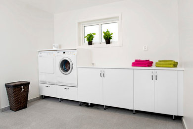 Photo of a transitional laundry room in Gothenburg.