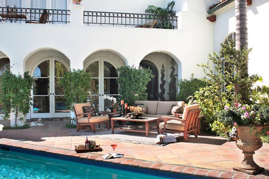 Patio - mediterranean patio idea in Los Angeles with no cover