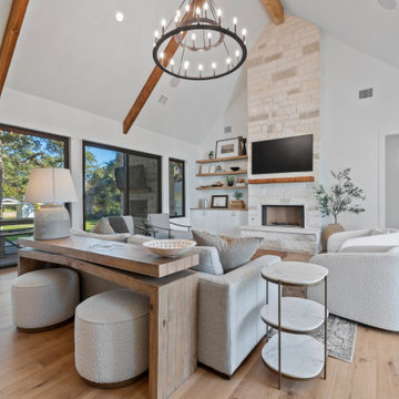 Modern Lakeside Farmhouse Living Room with Vaulted Ceiling and Exposed Beams