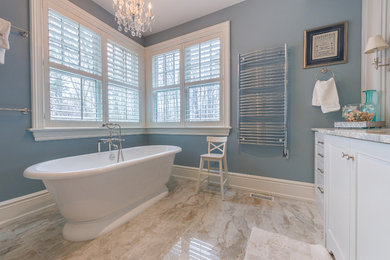 Freestanding bathtub - large traditional master freestanding bathtub idea in Toronto with shaker cabinets and white cabinets