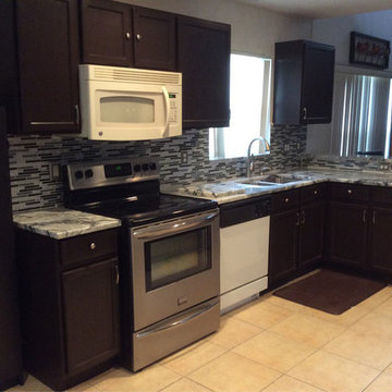 Silver Cloud Granite Countertops with Backsplash Tiles