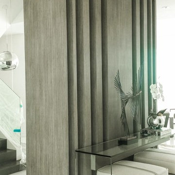 Brickell private condo - Custom columns wrapped with wood architectural film.
