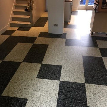 Installing Marmoleum Artoleum in a Black & White Pattern to Hall