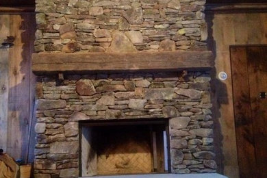 Mountain style family room photo in Other