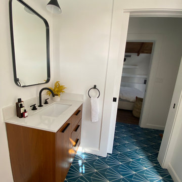 Bathroom complete remodel Mid Century style, toilet and vanity space.