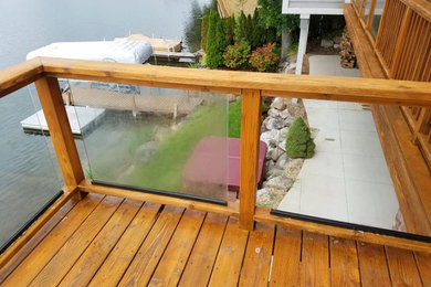 Inspiration for a mid-sized modern backyard deck remodel in Detroit