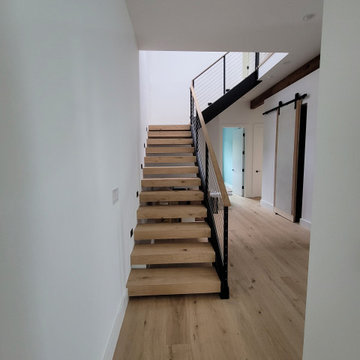 Pacheco St floating stairs with steel stringers