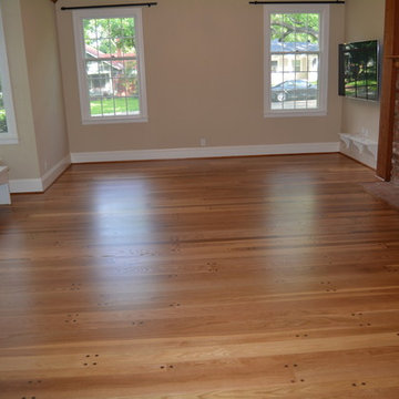 Random width white oak floors with walnut pegs - refinished with natural color