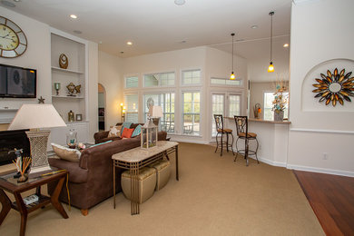 Example of a mid-sized classic home design design in Other