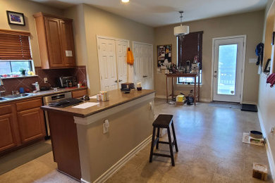 Example of a country kitchen design in Austin