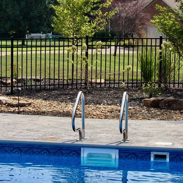 Aluminum fence protection for backyard pool photo