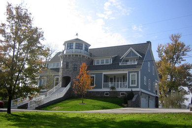 Mid-sized traditional gray three-story mixed siding gable roof idea in Louisville