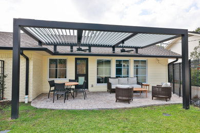 Patio - stone patio idea in Houston